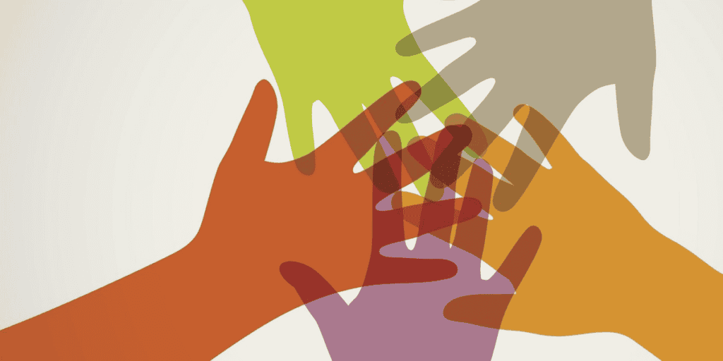 The image shows an illustration of five hands, each of a different colour, coming together to form a team. This symbolises unity, equity and inclusivity.